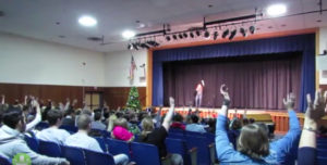 Heather speaking at a high school in Romulus, NY.